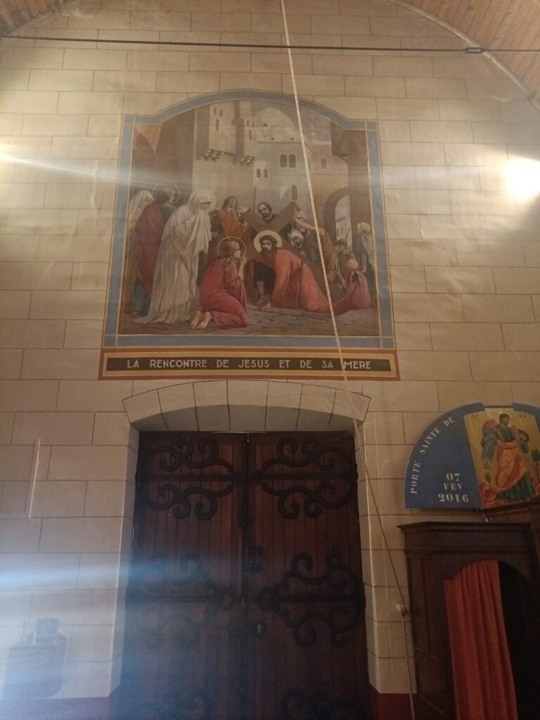 La fresque au dessus de la porte